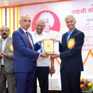 By Honrable Vice Chancellor Pune university.